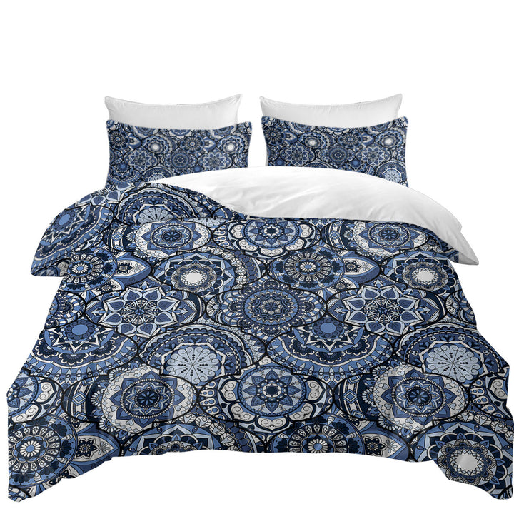 A Pile of Blue Oriental Mandalas Coverlets