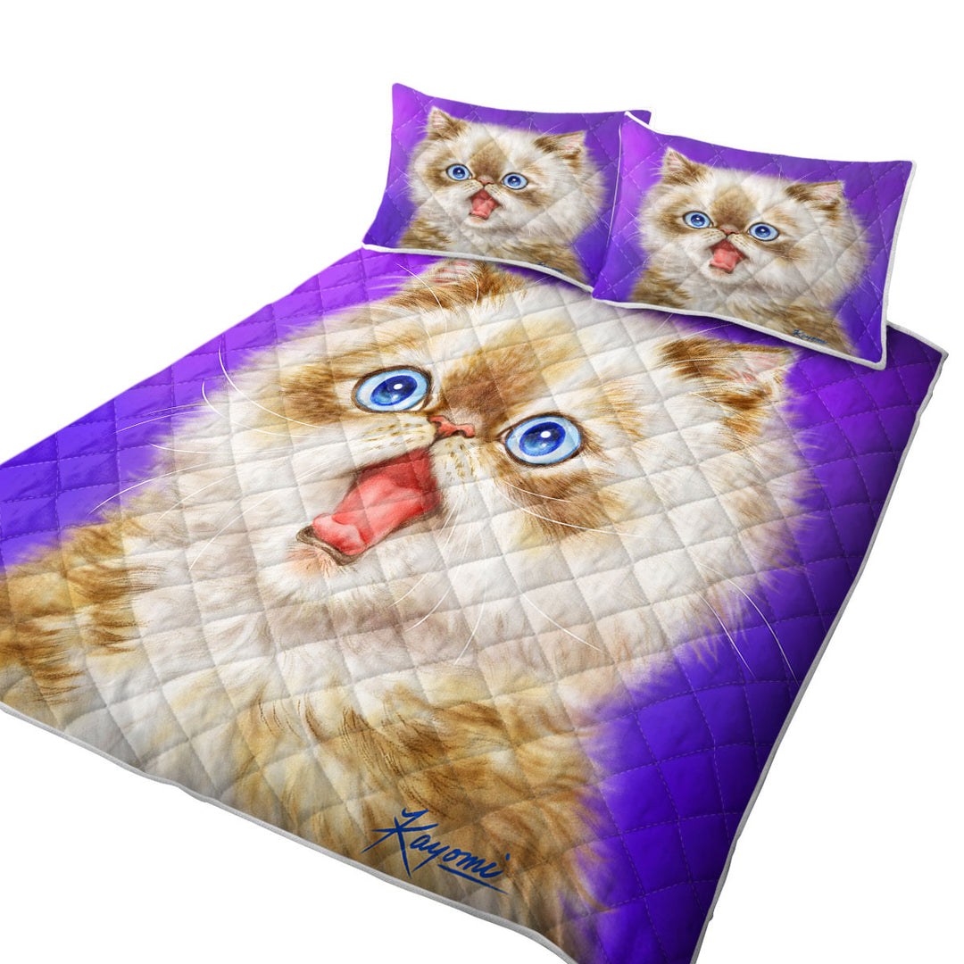 Beautiful Kitten in Shock over Purple Quilts