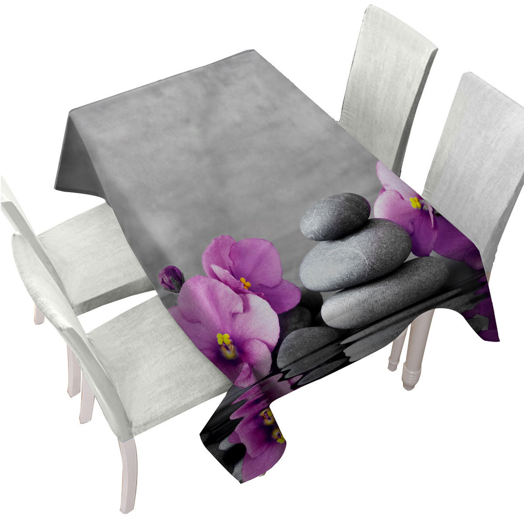 Custom table Covers with Purple Orchid Flower over Spa Pebbles