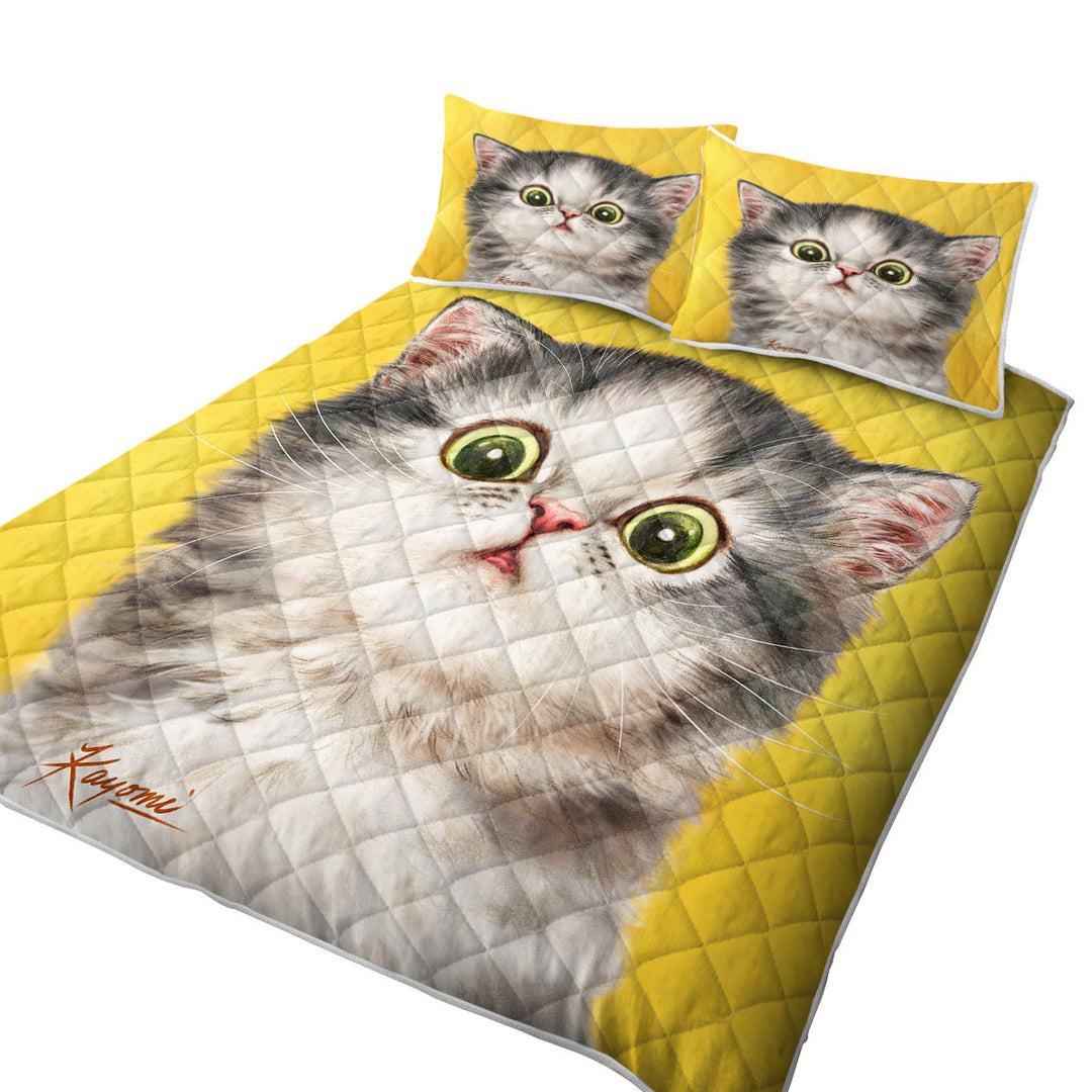 Cute Confused Kitty Cat over Yellow Coverlet
