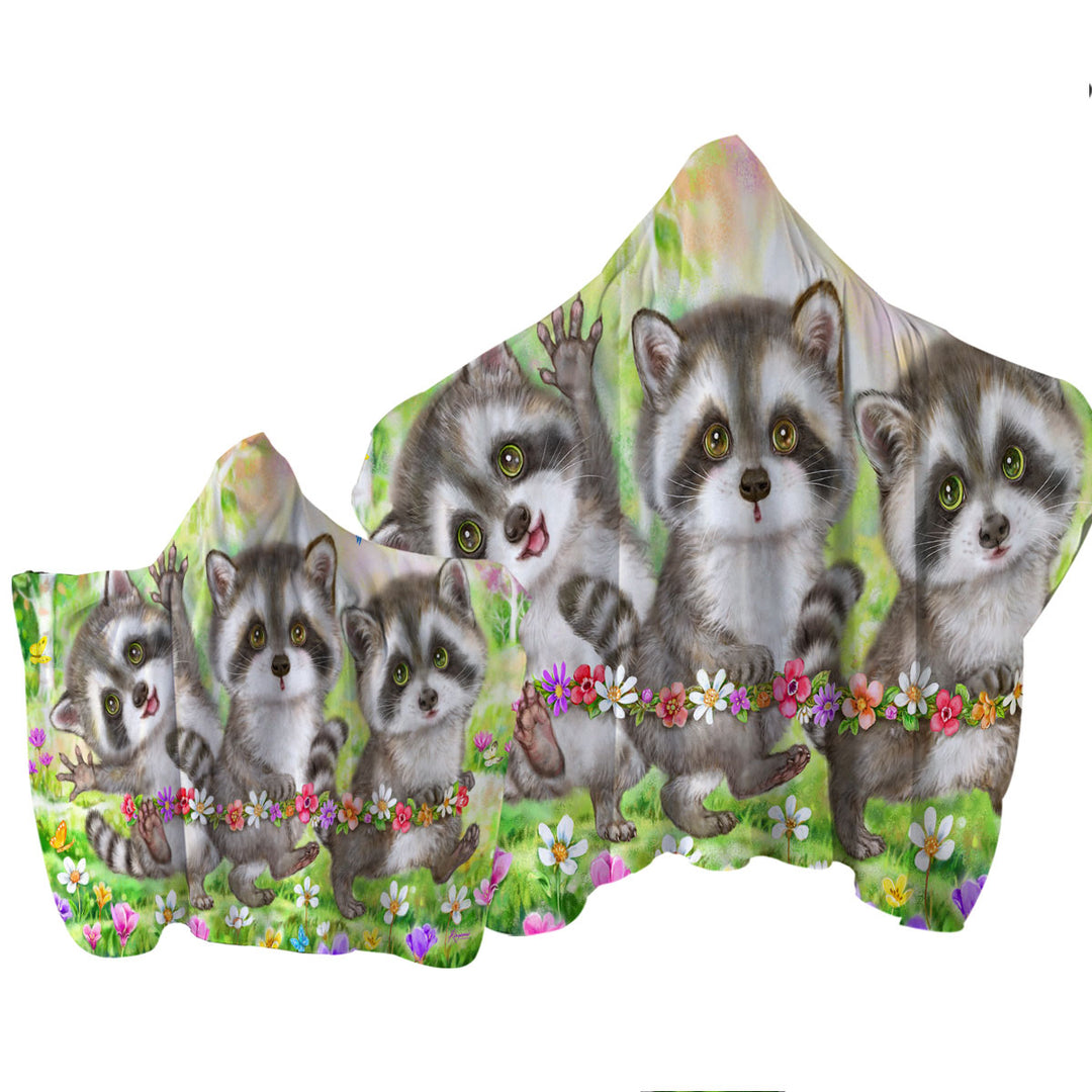 Flowers and Three Raccoons in the Forest Hooded Beach Towel