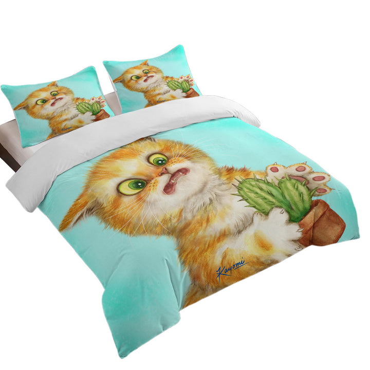 Funny Ginger Cat Playing with a Cactus Comforter Cover