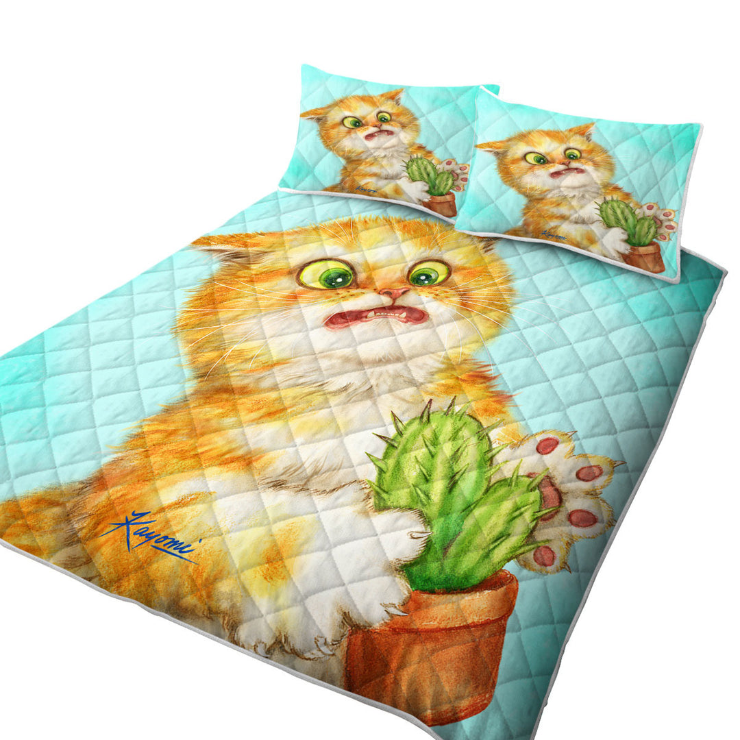 Funny Ginger Cat Playing with a Cactus Coverlet