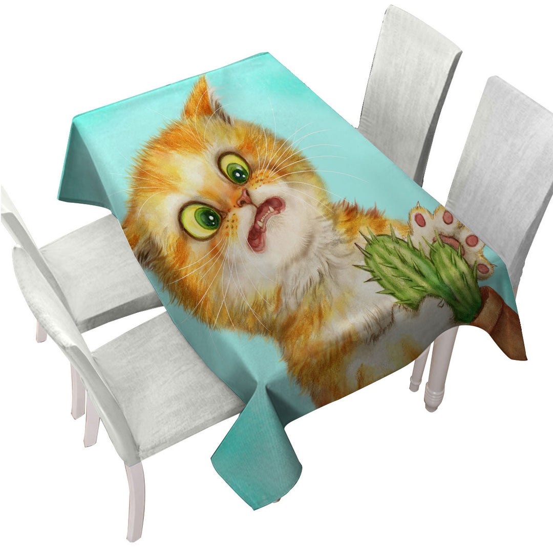 Funny Ginger Cat Playing with a Cactus Tablecloths