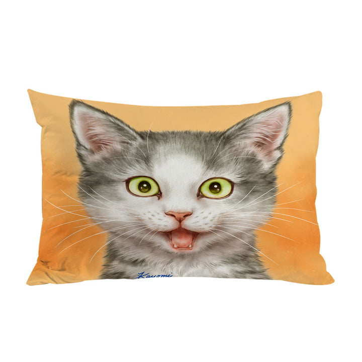 Happy and Joyful Grey Kitten over Orange Pillowcases