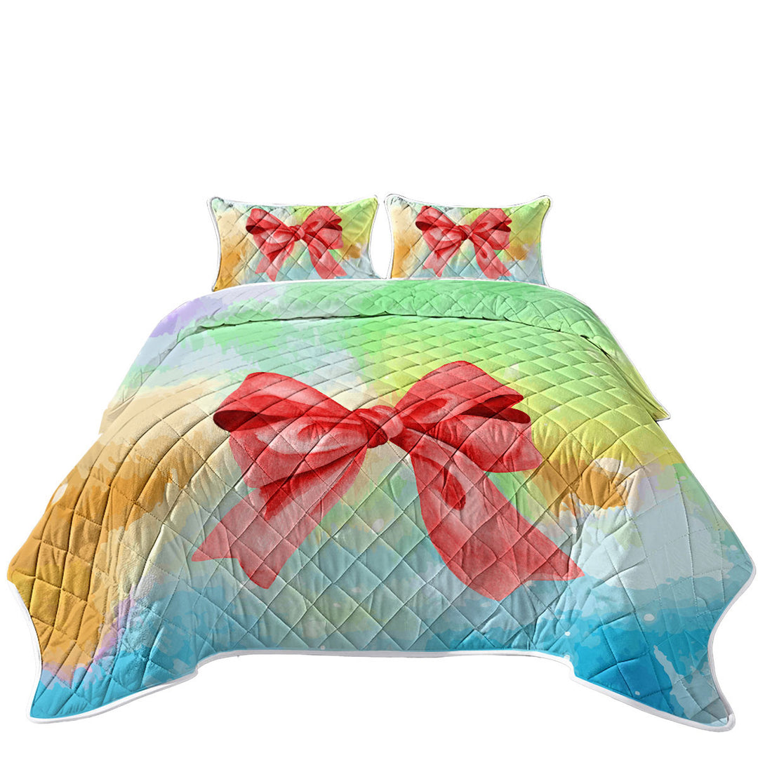 King Size Bedspreads with Red Ribbon over Pastel Colors