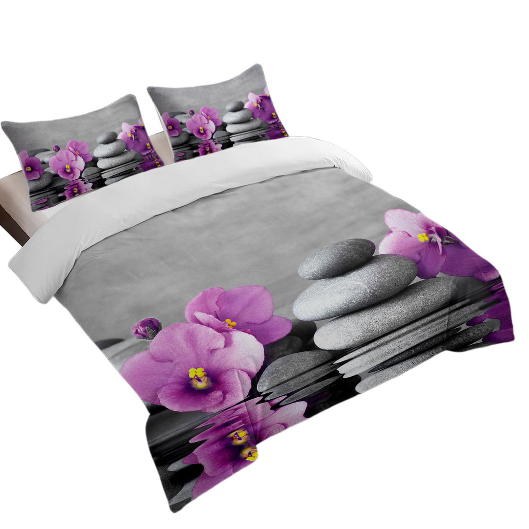 King Size Duvet Cover with Purple Orchid Flower over Spa Pebbles
