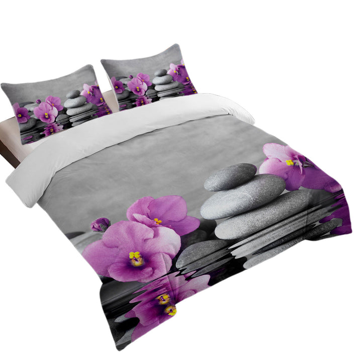 King Size Duvet Cover with Purple Orchid Flower over Spa Pebbles