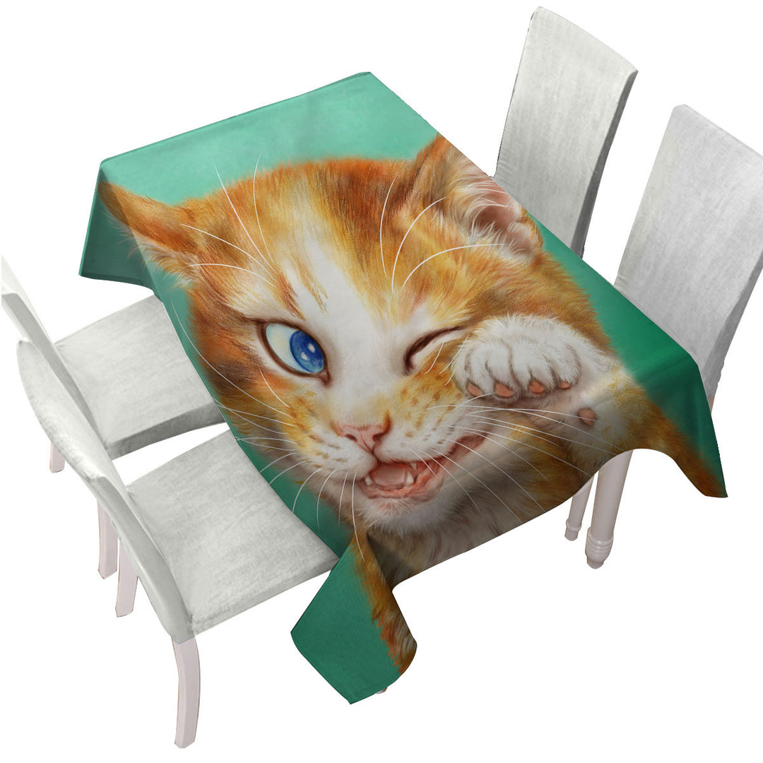Paintings of Cute Ginger Cat over Green Tablecloth