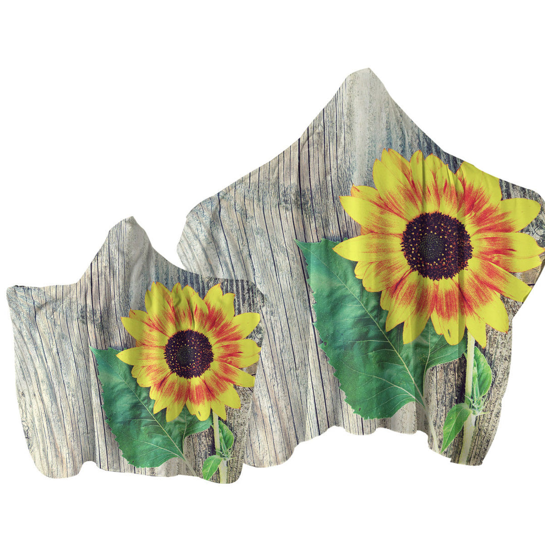 Single Sunflower over Wooden Deck Towel Hoodie