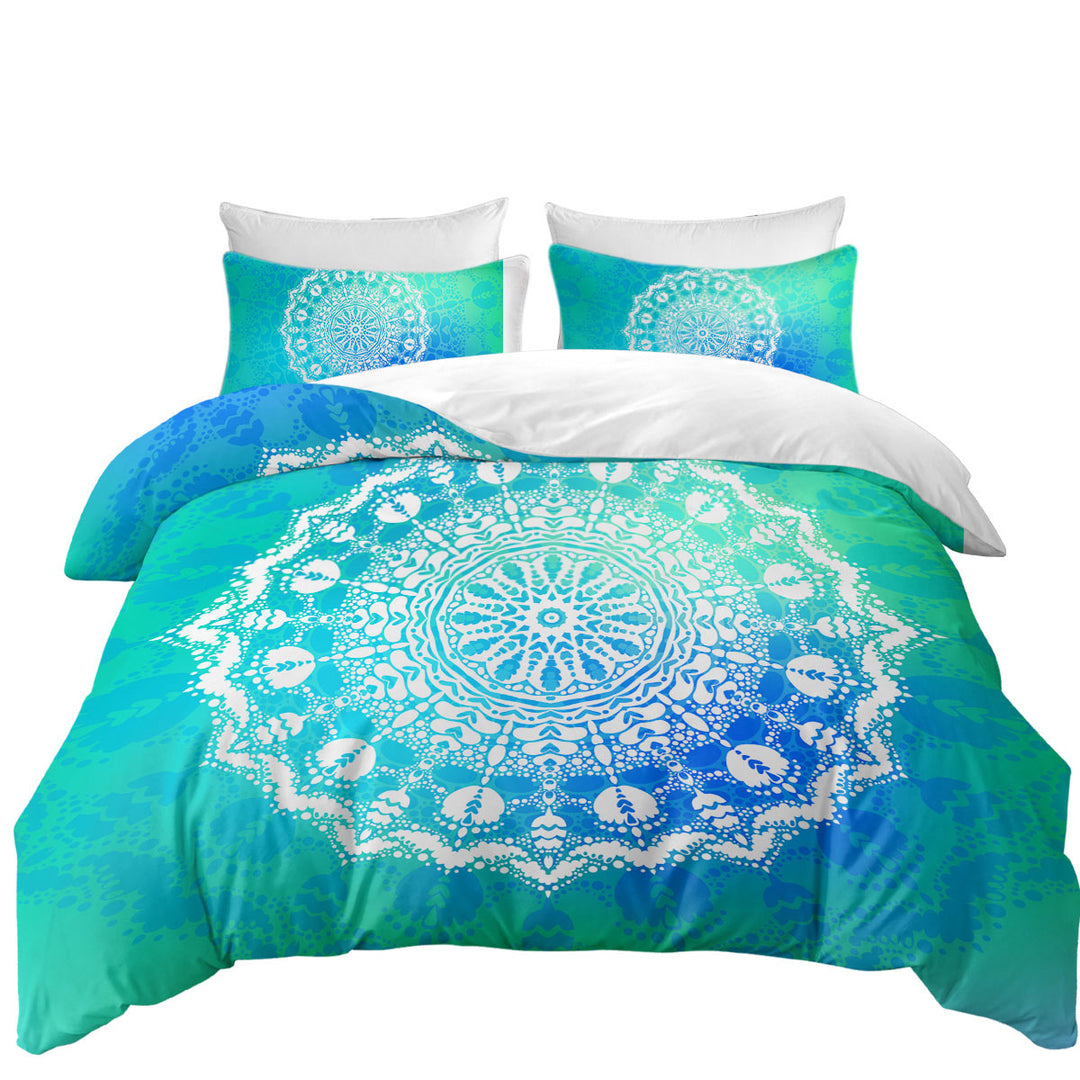 White Mandala over Bright Blue Green Bed Covers