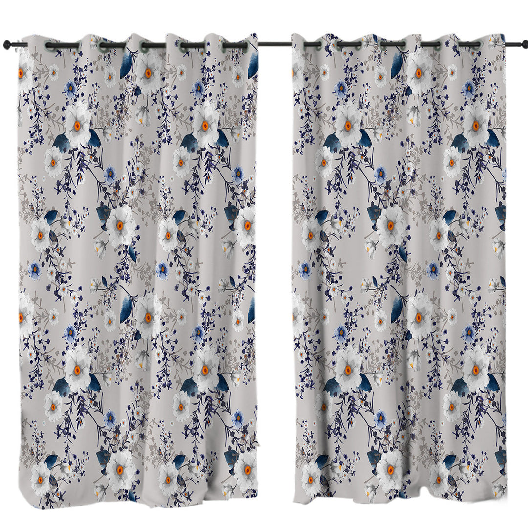 White and Blue Flowers over Grey Drapes and Curtains