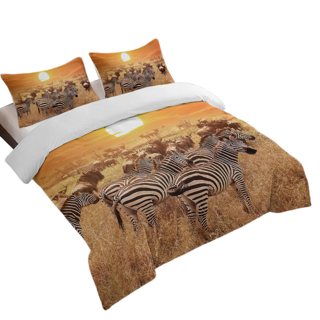 Wild Wildebeest and Zebra at Sunset Duvet Covers