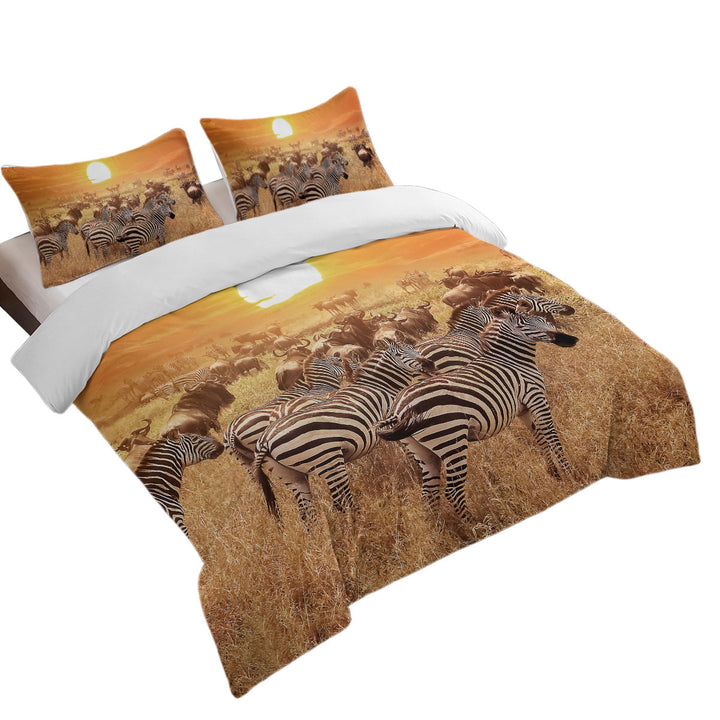 Wild Wildebeest and Zebra at Sunset Duvet Covers