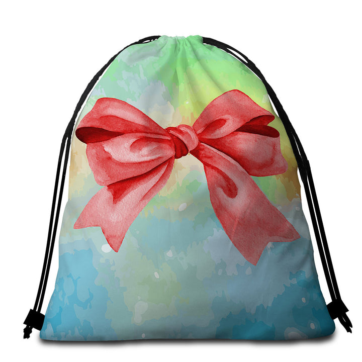 Beach Towel Bags with Red Ribbon over Pastel Colors