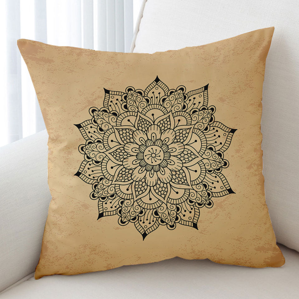 Black Mandala Cushion Cover over Light Tan