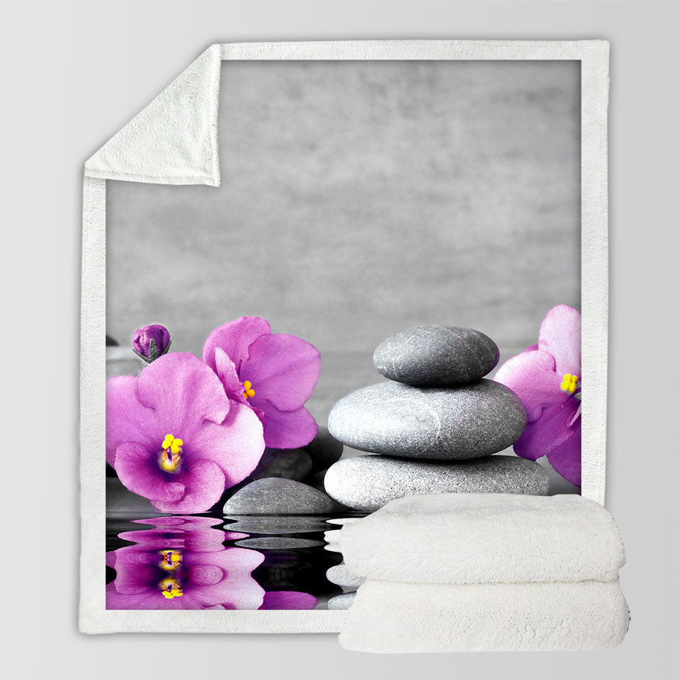 Decorative Blankets Purple Orchid Flower over Spa Pebbles