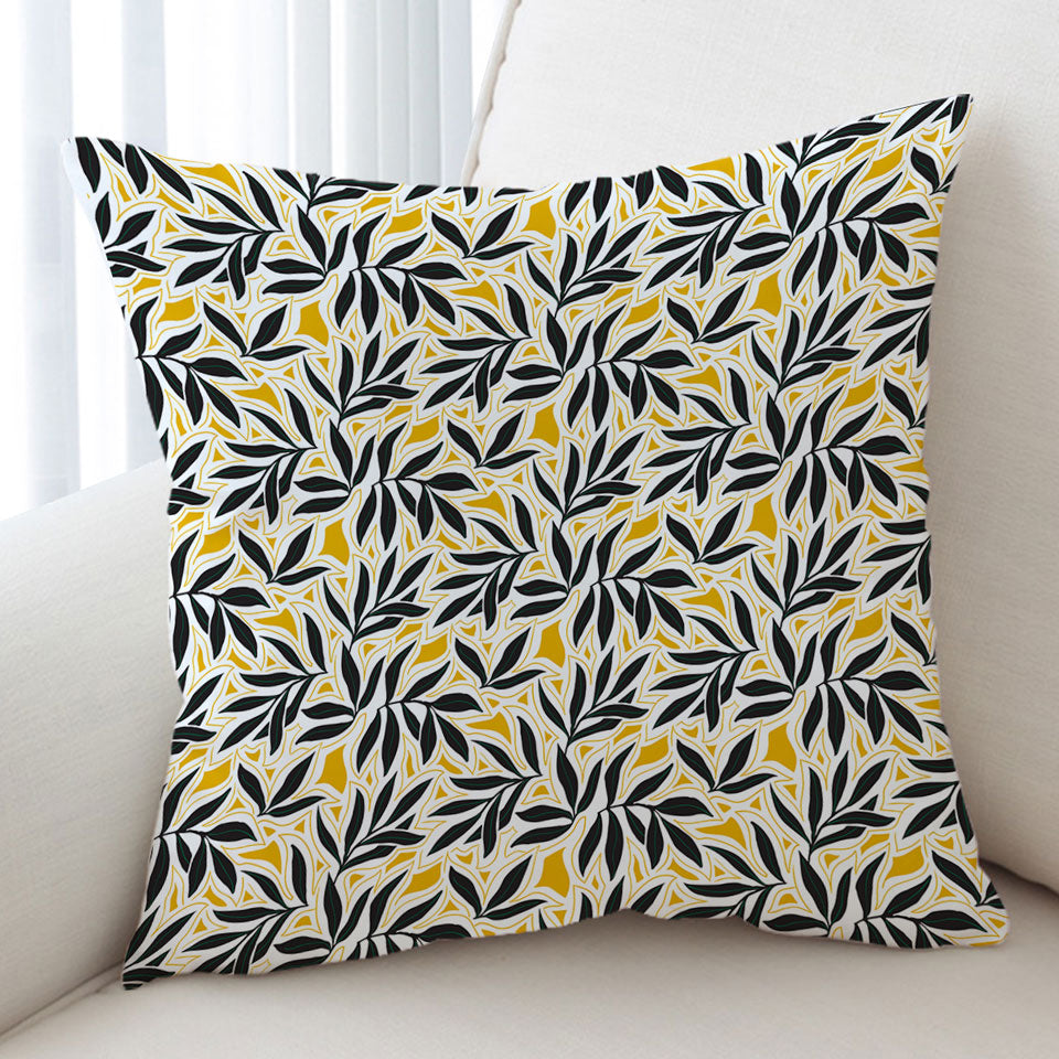 Decorative Cushions with Dark Green Leaves over Yellow