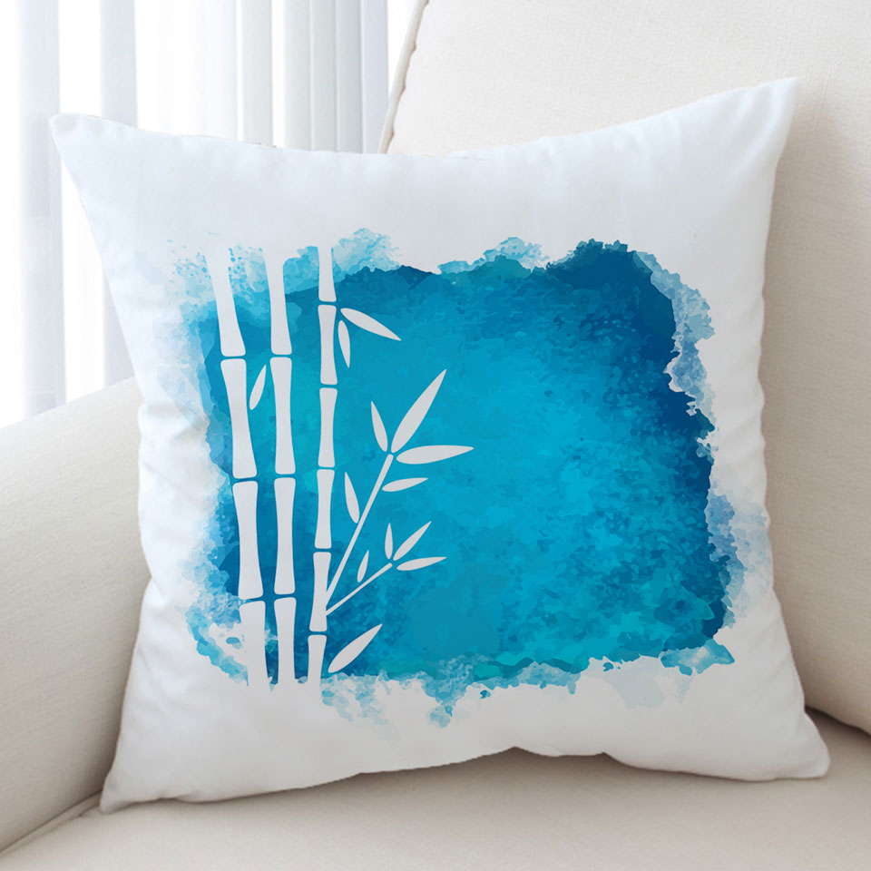 Decorative Pillows with White Bamboo Silhouette over Ocean Blue Paint