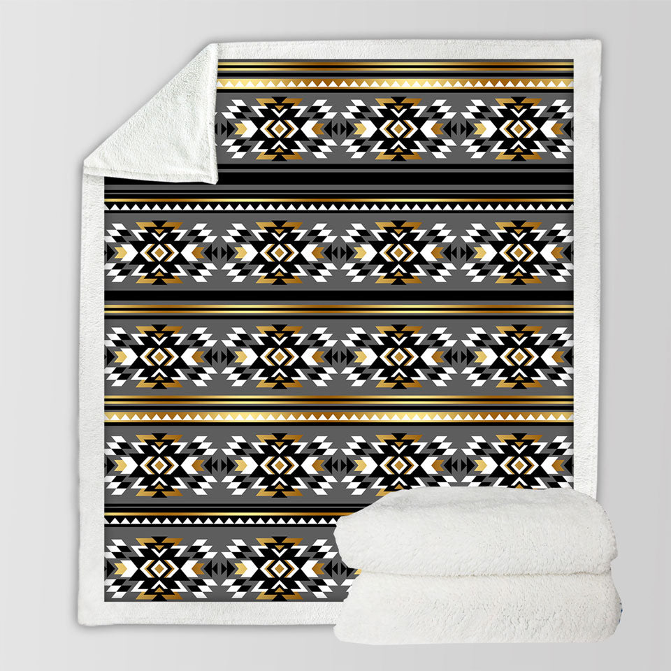 Decorative Throws of Golden Aztec Pattern over Grey