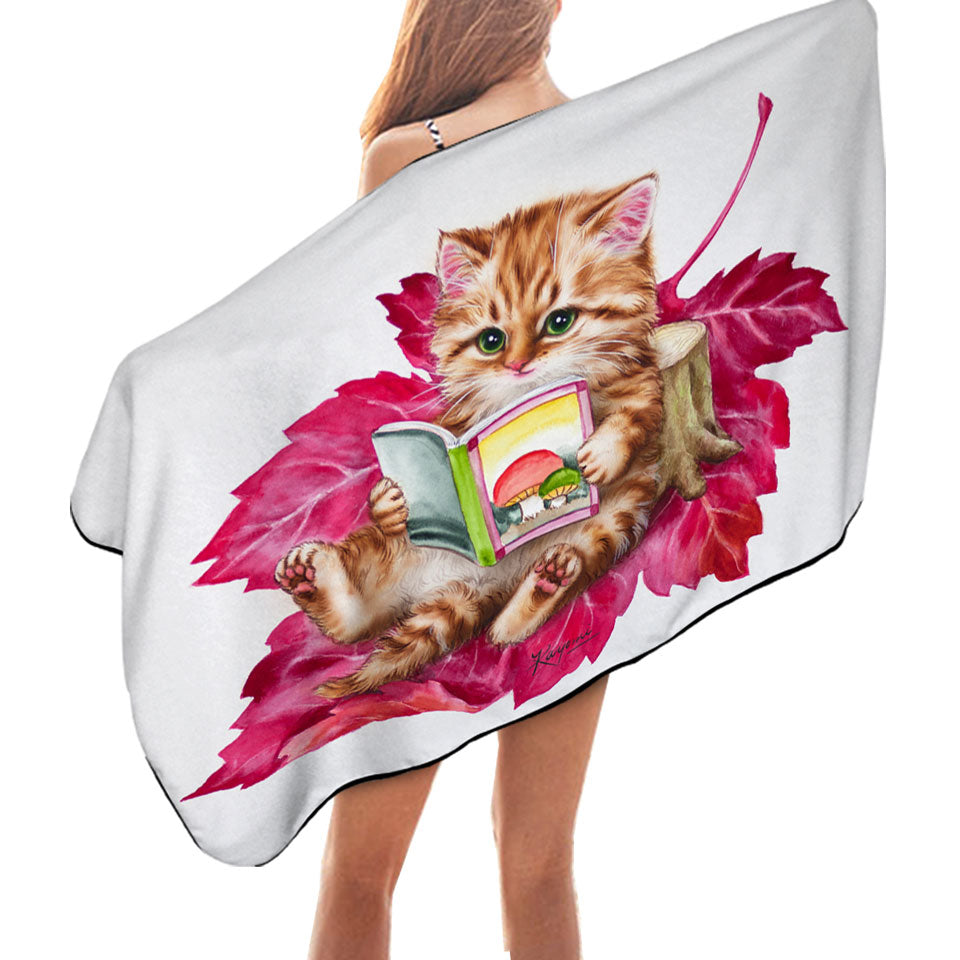 Funny Cat Ginger Kitten Reading a Book on Leaf Beach Towels
