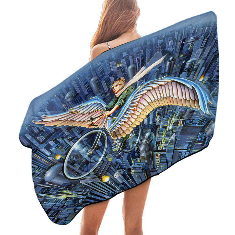 Future Icarus Bicycle Wings above the City Beach Towels