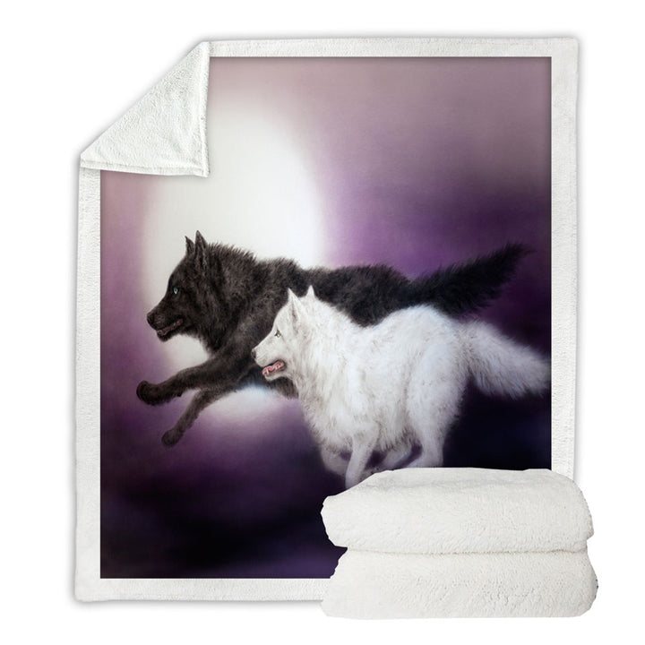 Moonlight Run Black and White Wolves Throw Blanket