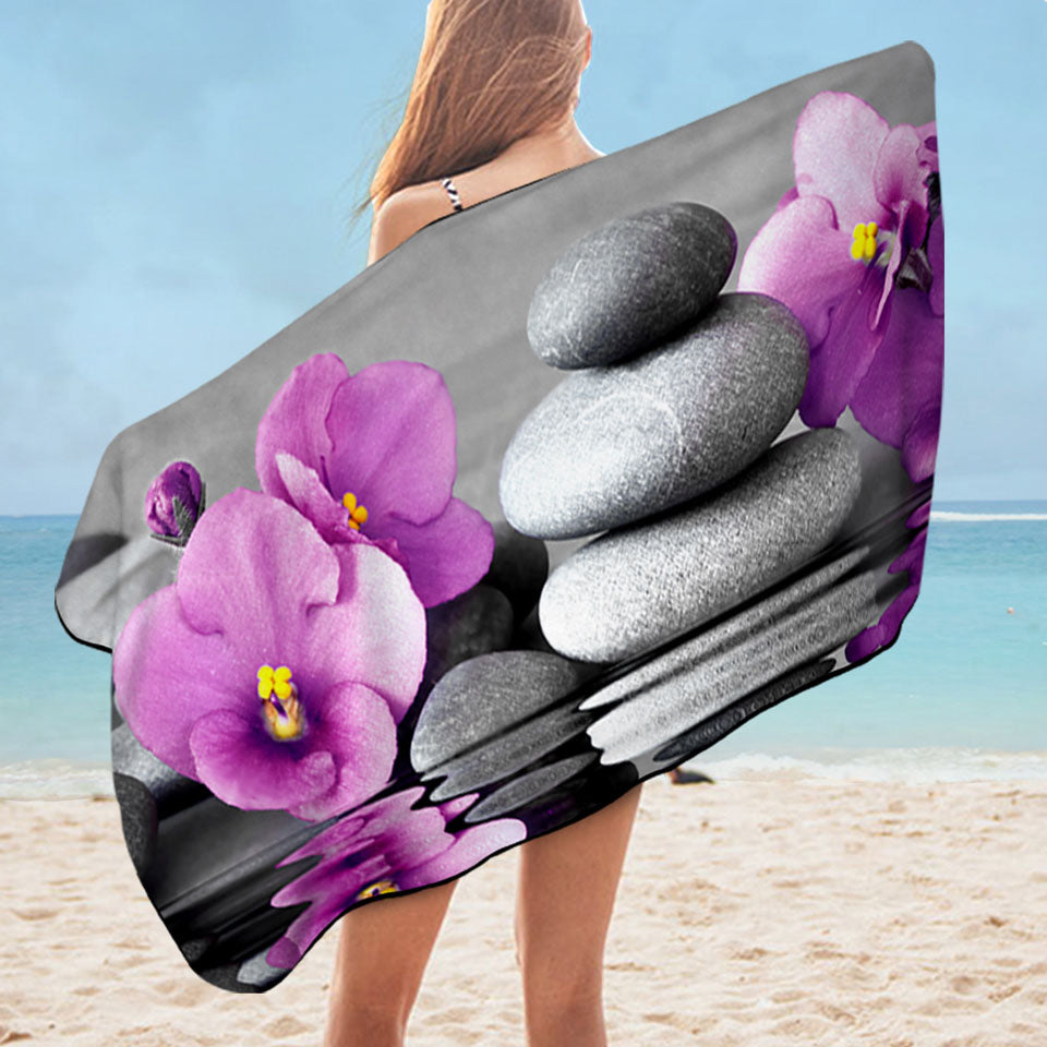 Nice Beach Towels Purple Orchid Flower over Spa Pebbles