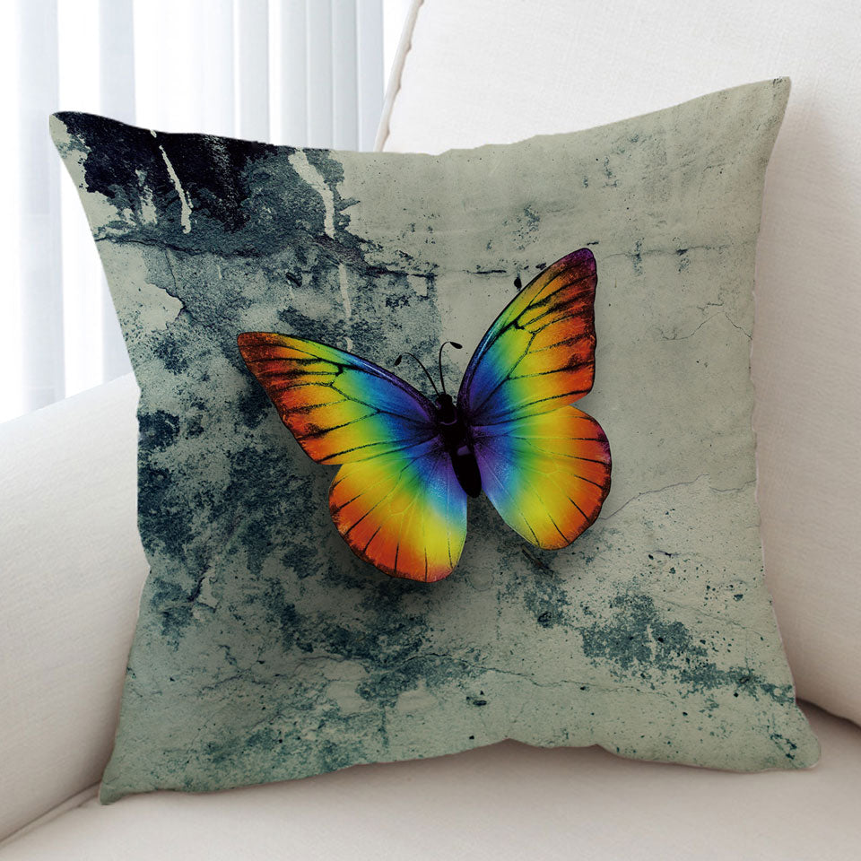 Rainbow Cushion Covers with Butterfly Over Concrete