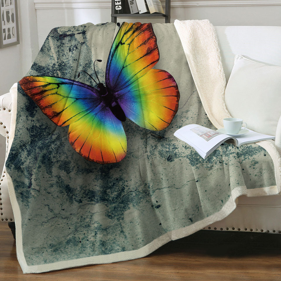 Rainbow Throws with Butterfly Over Concrete