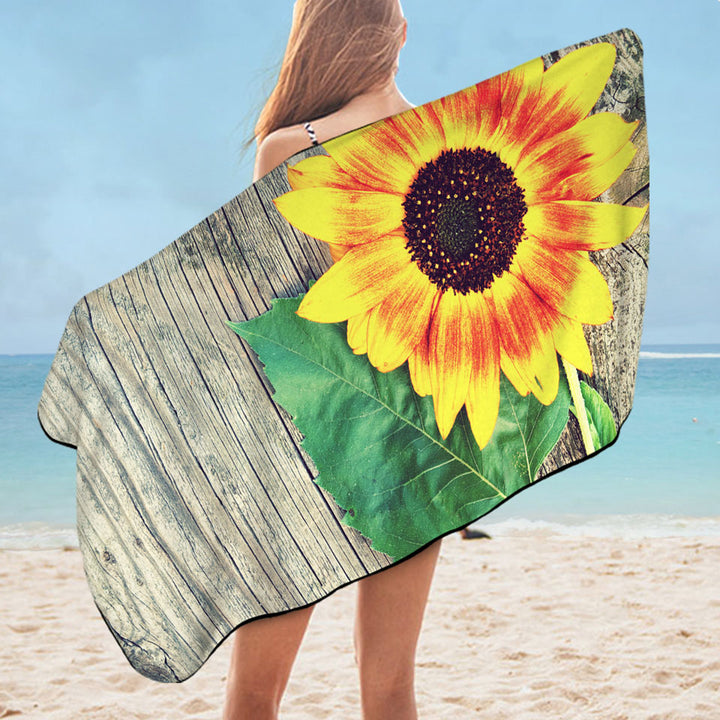 Single Sunflower over Wooden Deck Microfibre Beach Towels