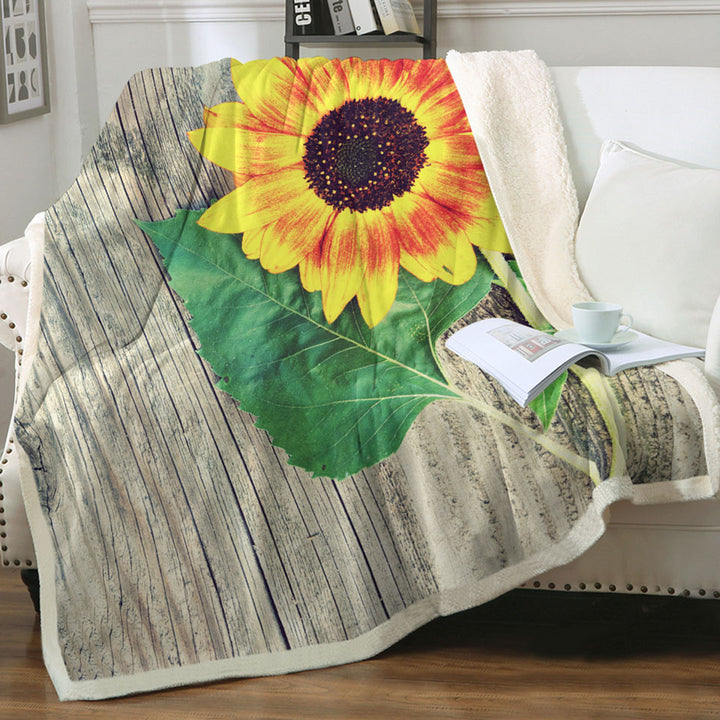 Single Sunflower over Wooden Deck Throws