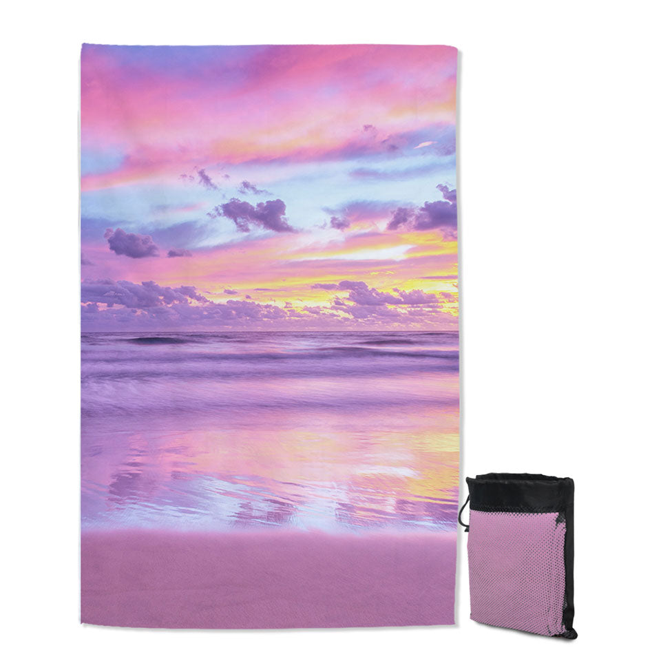 Stunning Beach Towels Ocean During Purplish Sunset