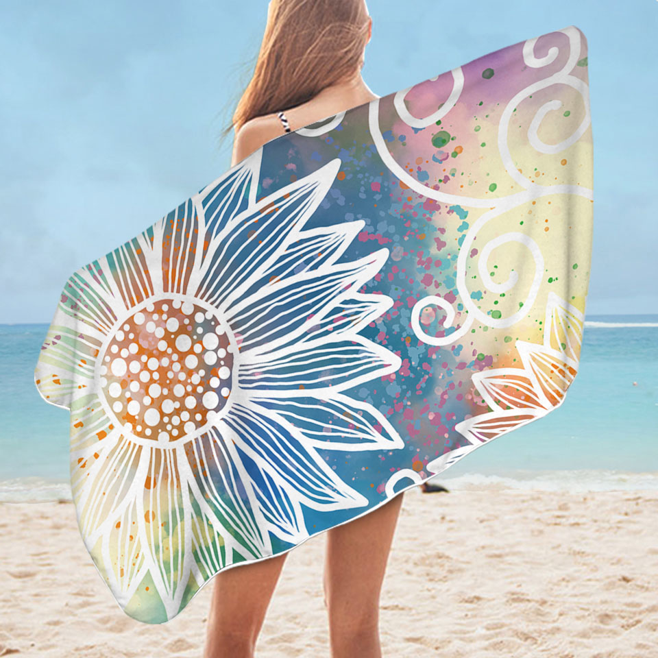 White Flower Drawings over Colorful Beautiful Beach Towels