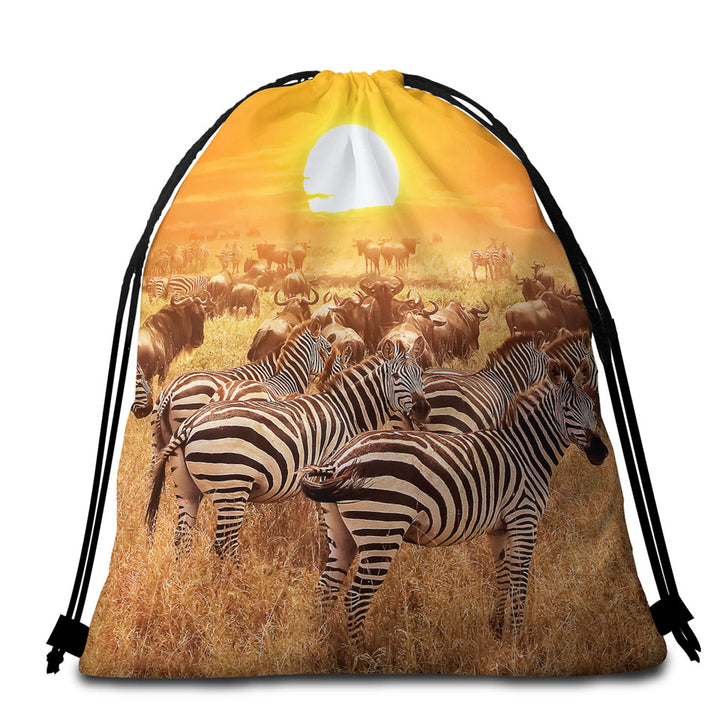 Wild Wildebeest and Zebra at Sunset Beach Bags and Towels
