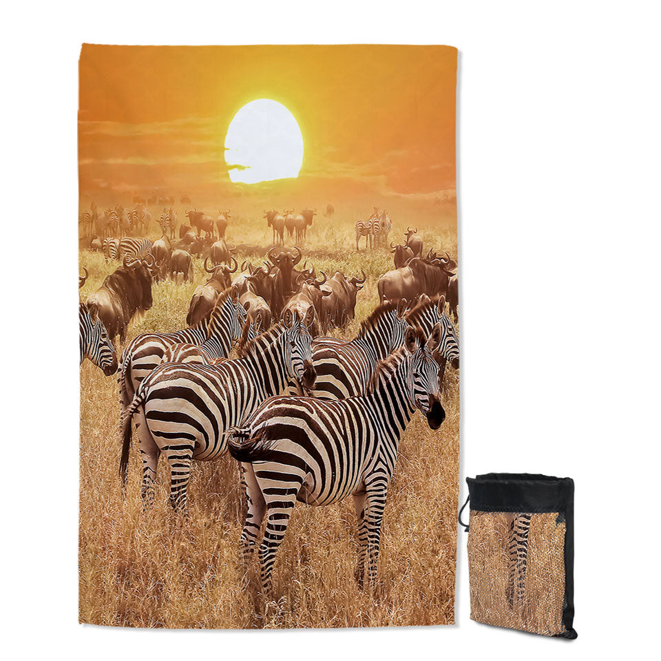 Wild Wildebeest and Zebra at Sunset Beach Towels